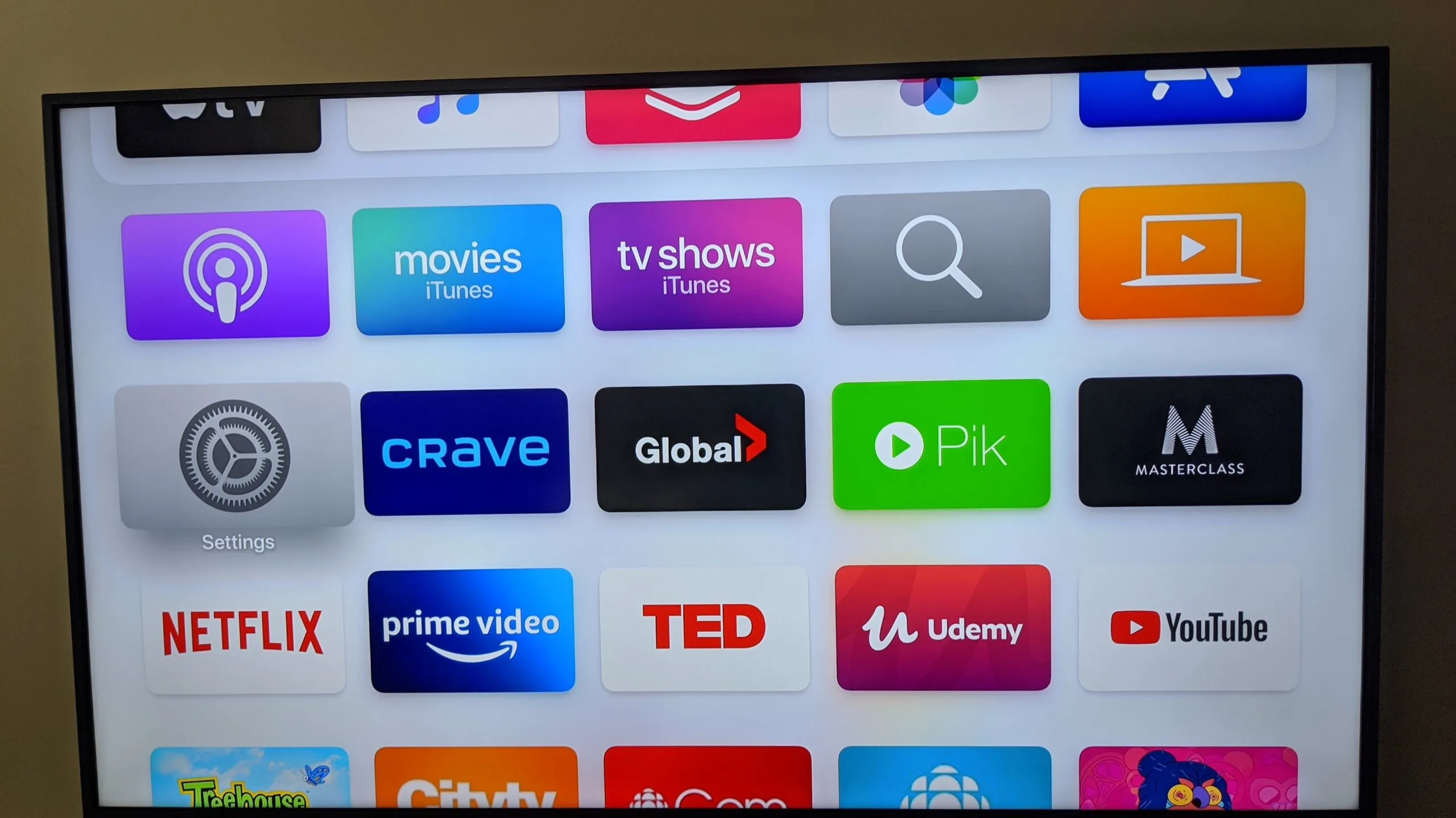 Apple TV playing on TV