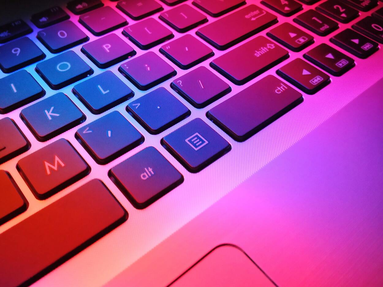A vibrant picture of a laptop's keyboard.