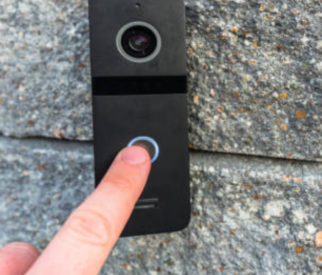 A black ring doorbell