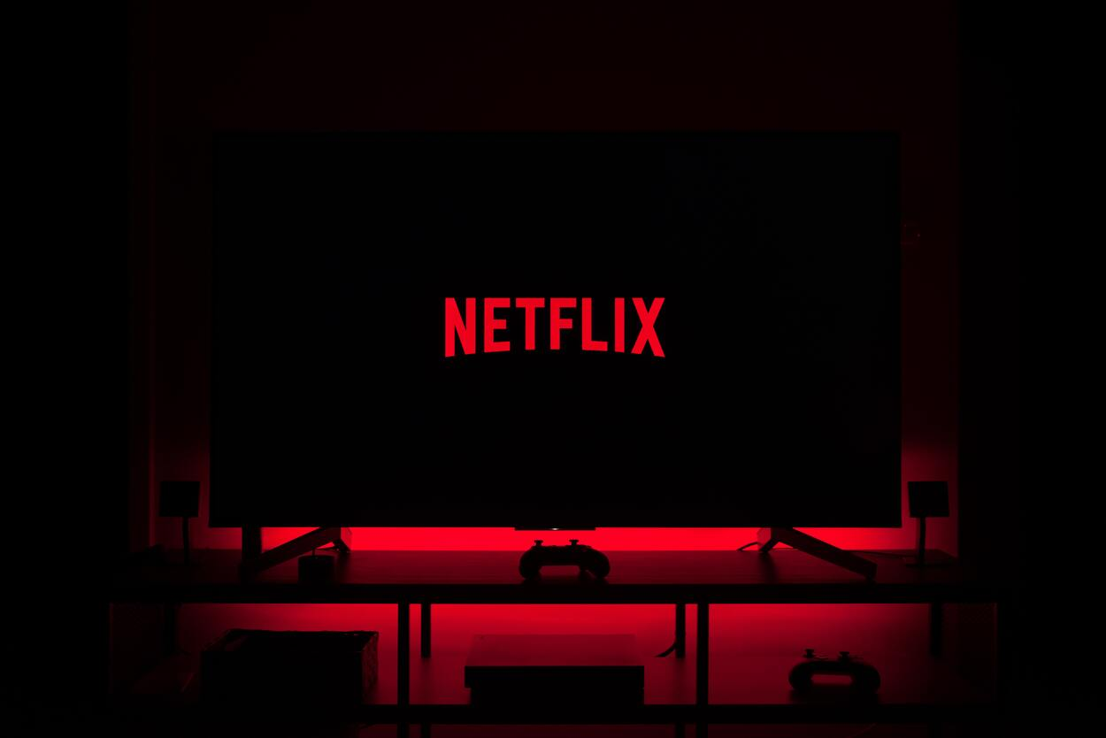 Netflix Logo on a screen with red backlighting
