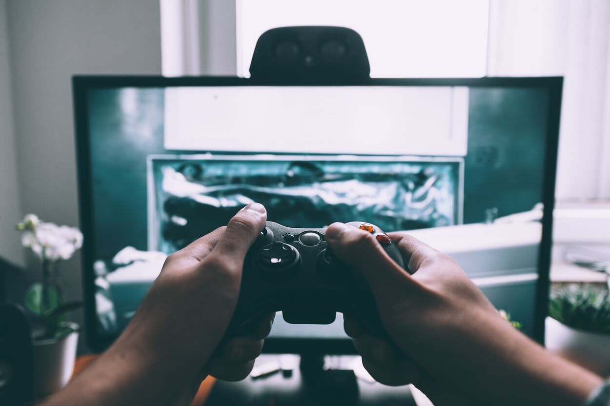 Image of person playing video games.
