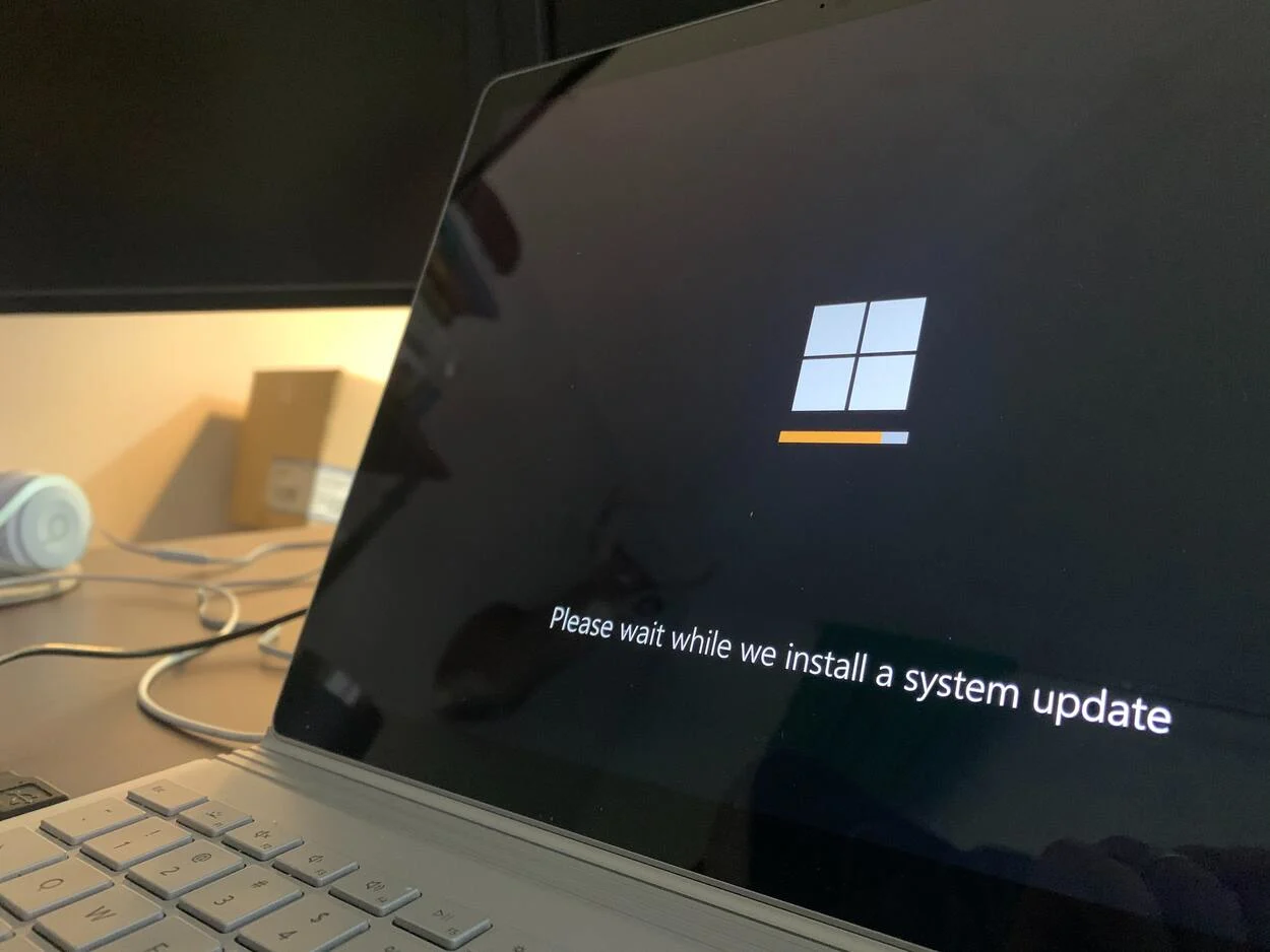 A windows laptop installing a system update.