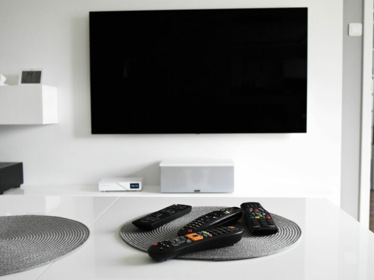White-bg-TV-with-multiple-remotes