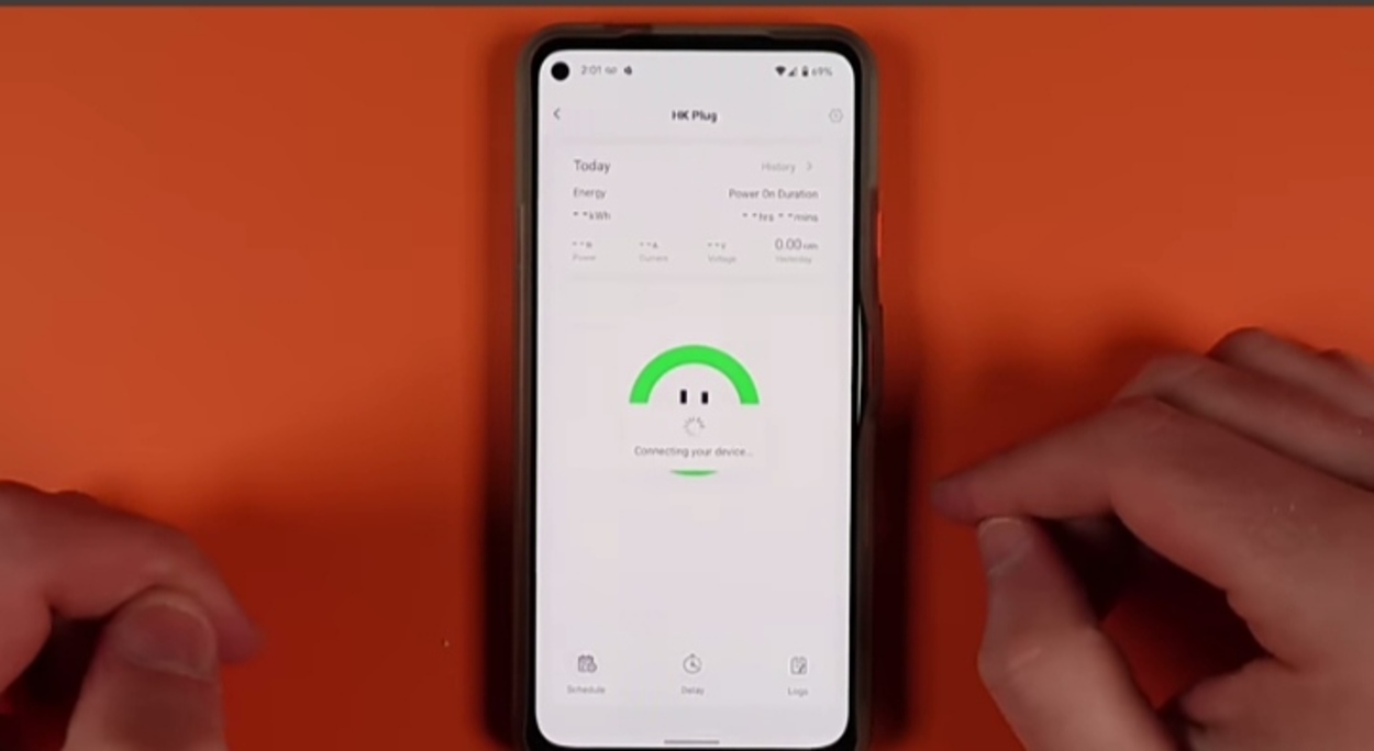 The mobile showing HomeKit Plug connecting to device