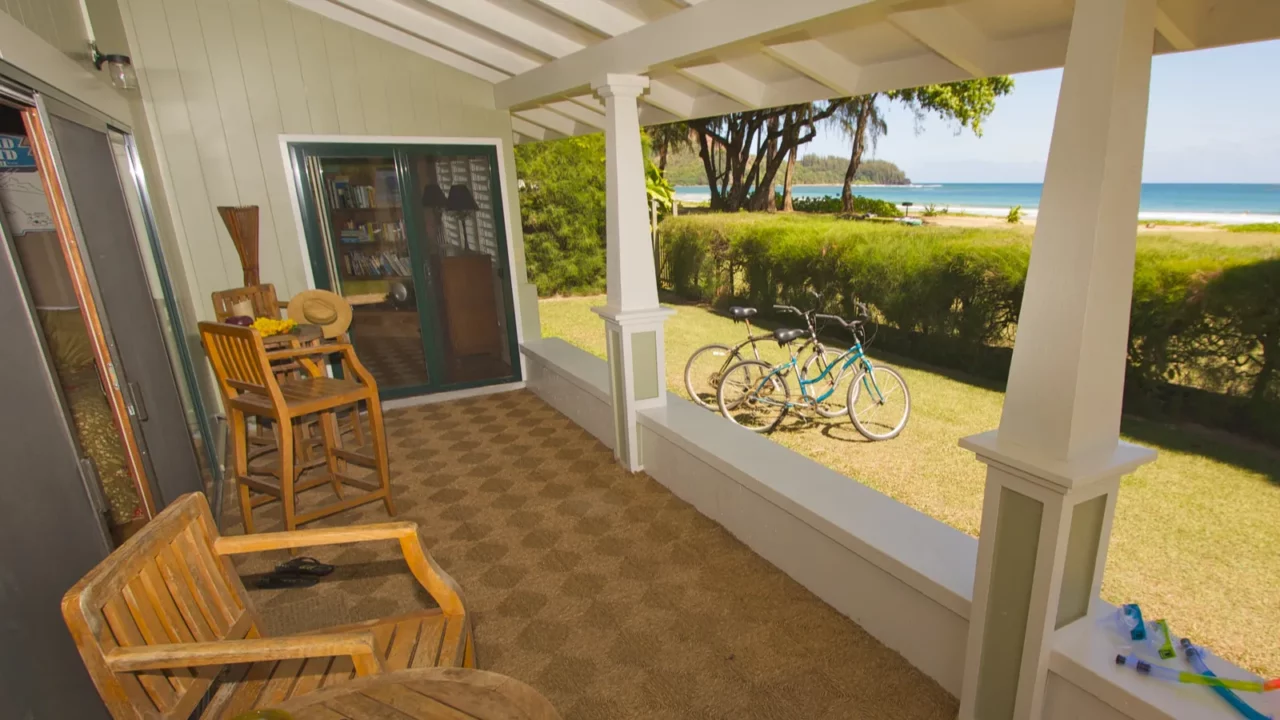 House lanai with beautiful view of a bay.