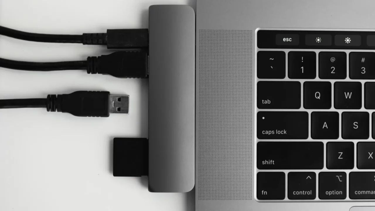 laptop with usb typec adapter with pluged usb cables and