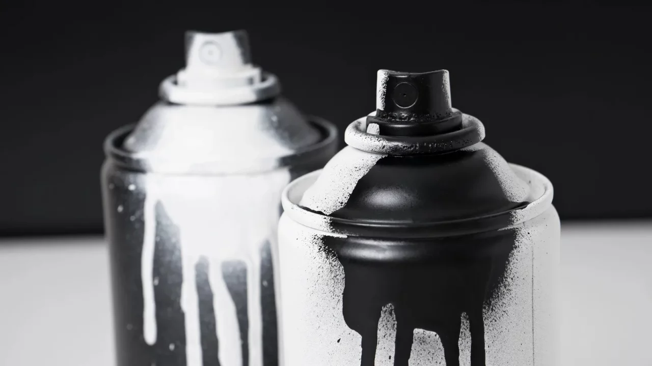 Black and white spray paint bottle