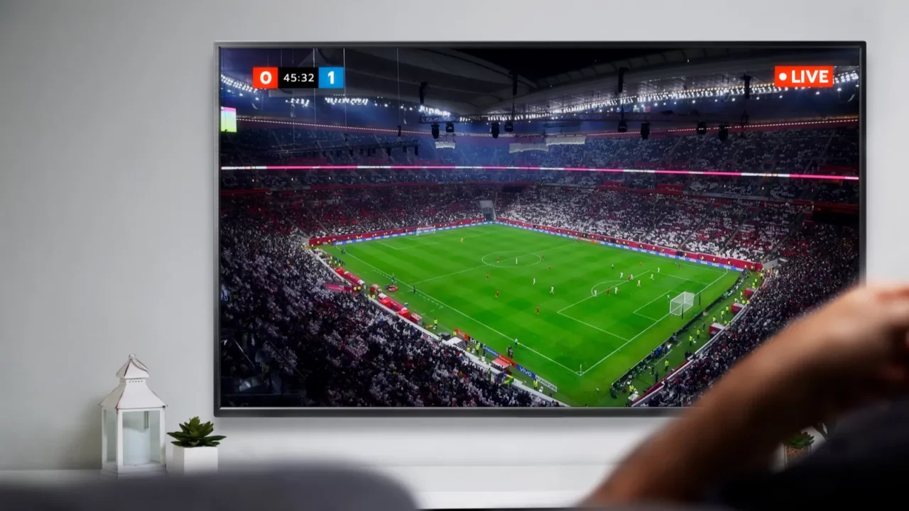 TV showing a live football match.