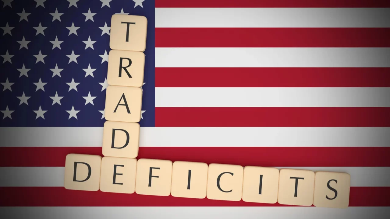 letter tiles trade deficits on us flag 3d illustration