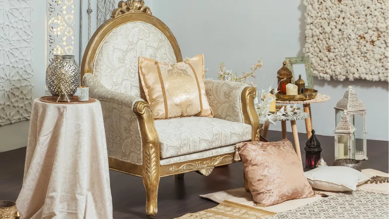white and gold interior chair and tables in oriental style