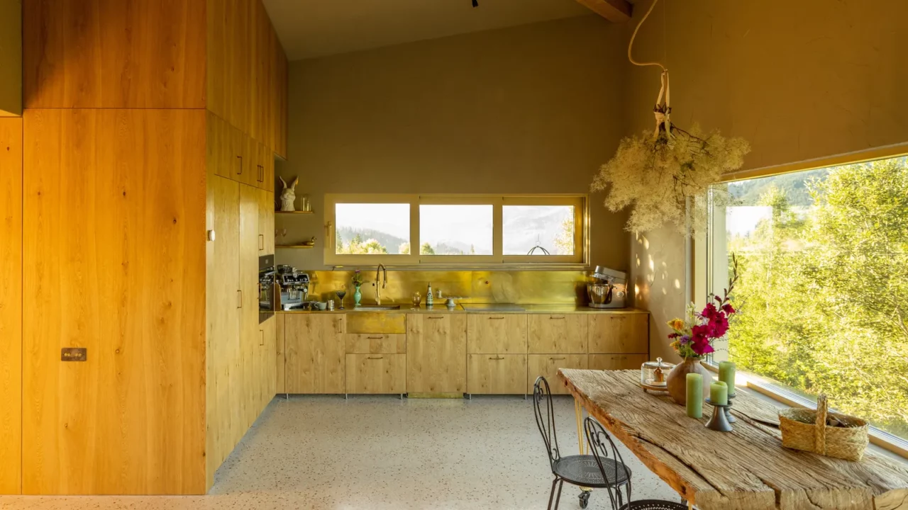 a cozy rustic kitchen with a natural wood design featuring